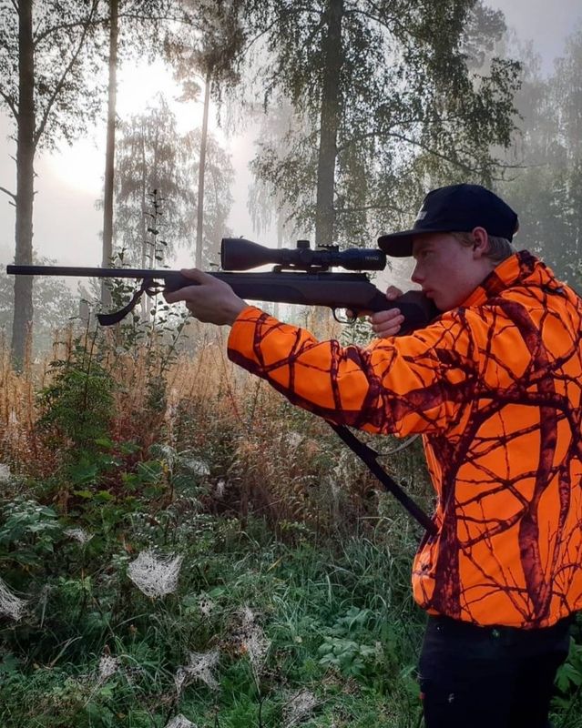Skjutstöd och vapenrem i ett